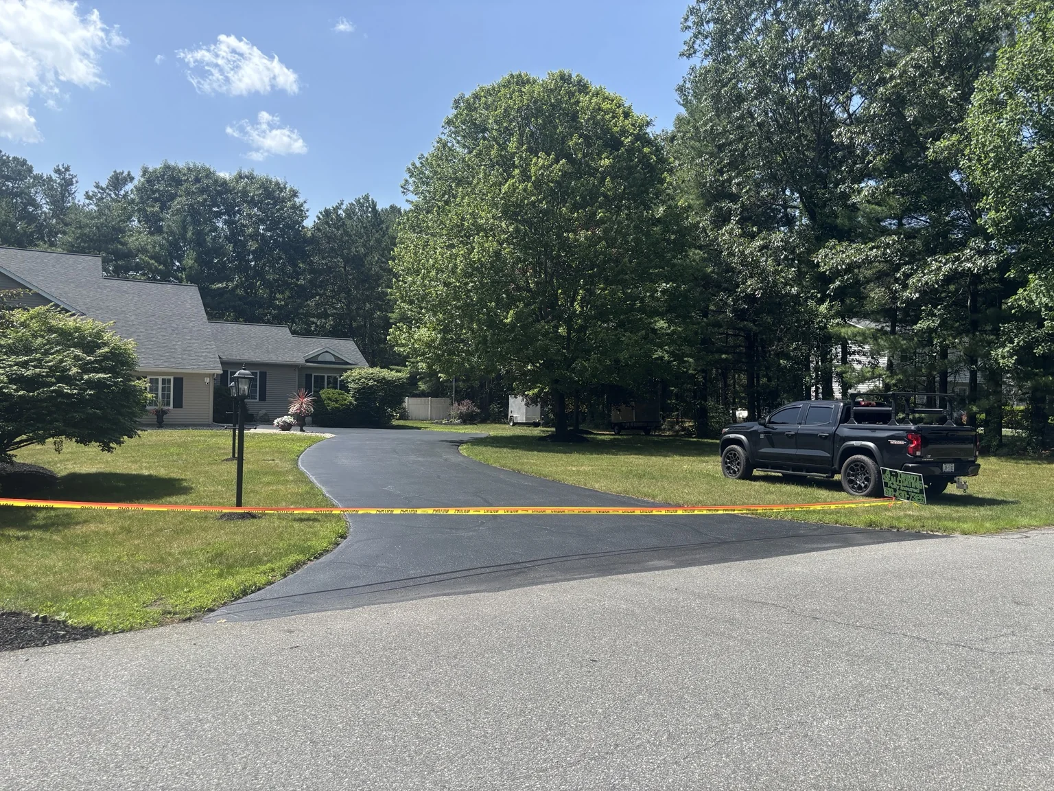 Freshly sealcoated residential driveway